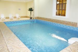 Riyam Hotel Muskat Bagian luar foto